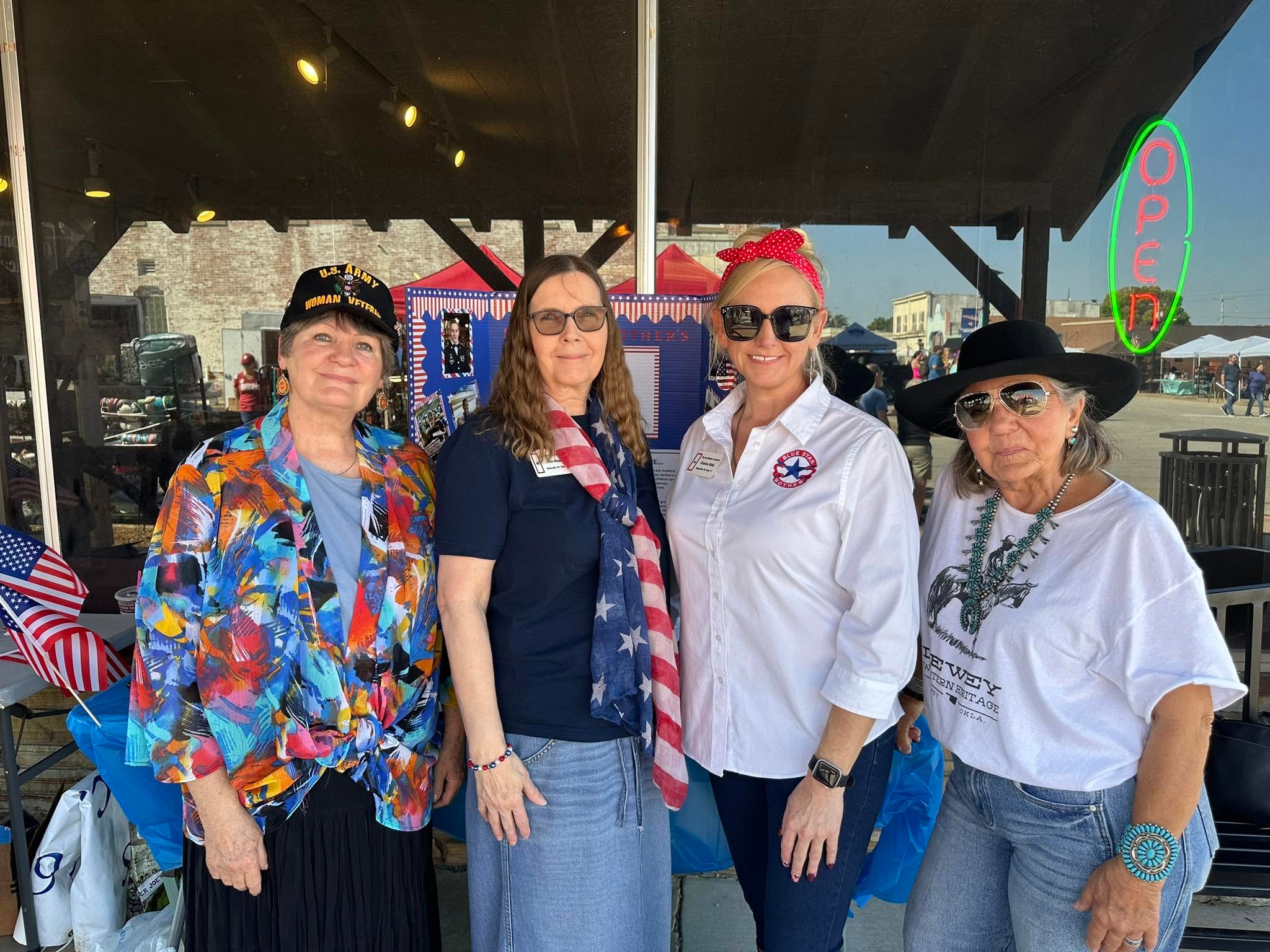 Four women at patriotic outdoor event